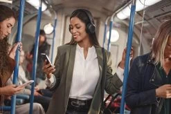 Jabra Evolve2 75 ANC Bluetooth Headset -JABRA Store jabra evolve2 75 lifestyle female tube standing phone medium 1 1