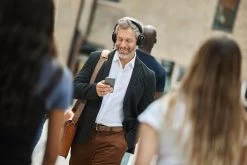 Jabra Evolve2 75 ANC Bluetooth Headset -JABRA Store jabra evolve2 75 lifestyle male street walking phone small 6